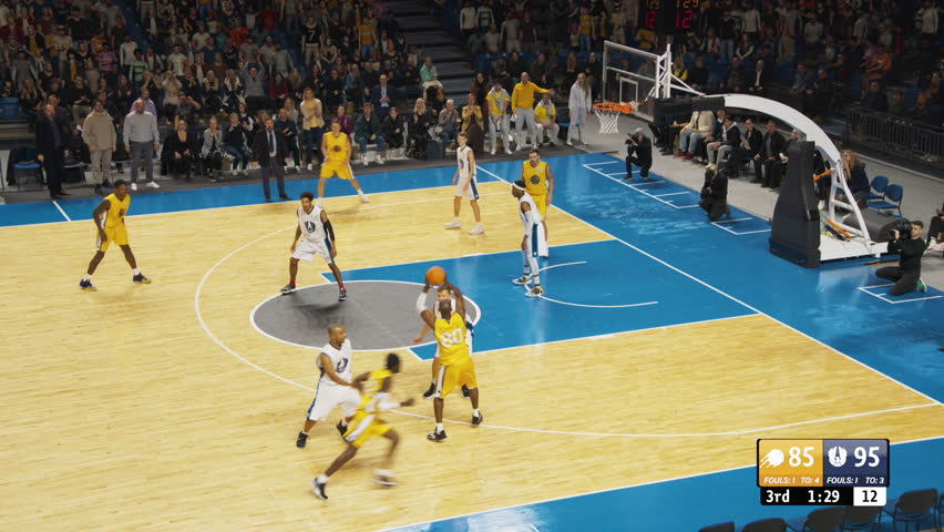 Basketball TV Broadcast Playback with Game Information on Screen. Two International Teams Playing at a Sold Out Arena. Teams Dribble, Pass the Ball, Score Goals During an Intense Championship Match