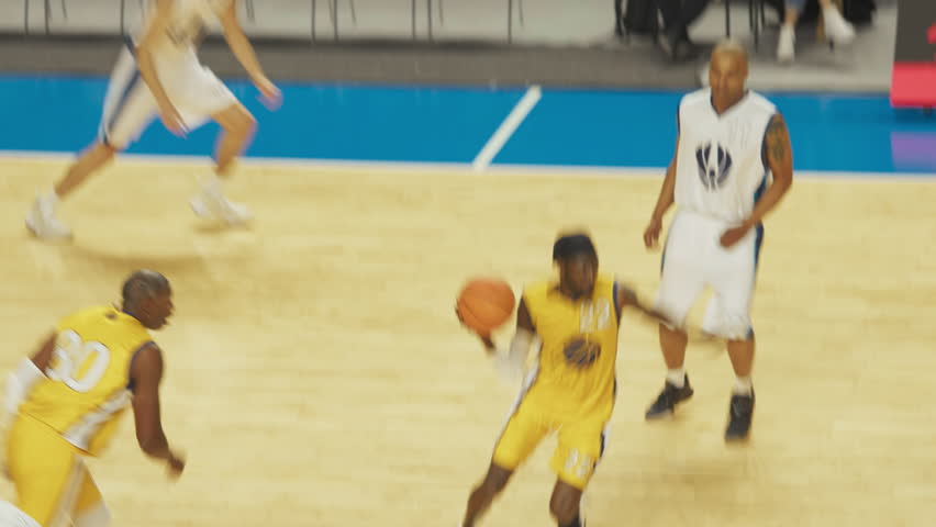 Basketball Championship Game Playback: Yellow Team Scores a Perfect Dunk Goal, Takes the Lead, Players Celebrating with High Fives. Tracking Footage of Joyful Sports Action on Live TV Broadcast | Shutterstock HD Video #1105233299