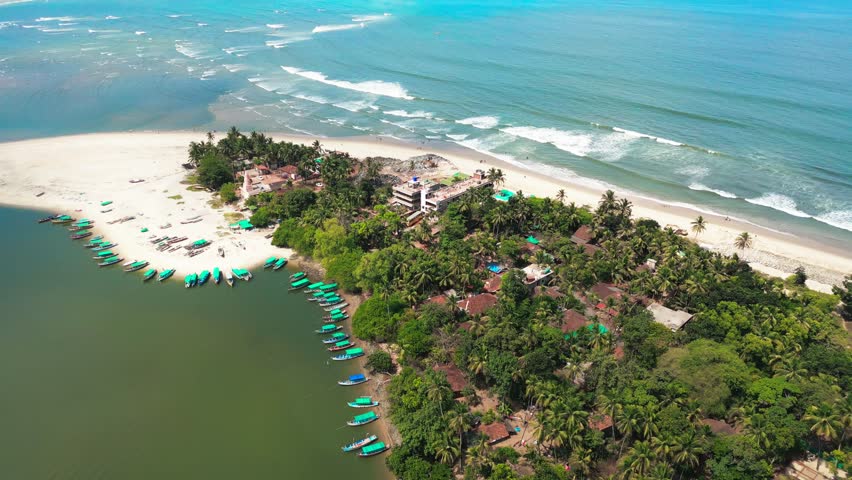 beautiful devbag island in a river bird eye wide to closeup view in malvan