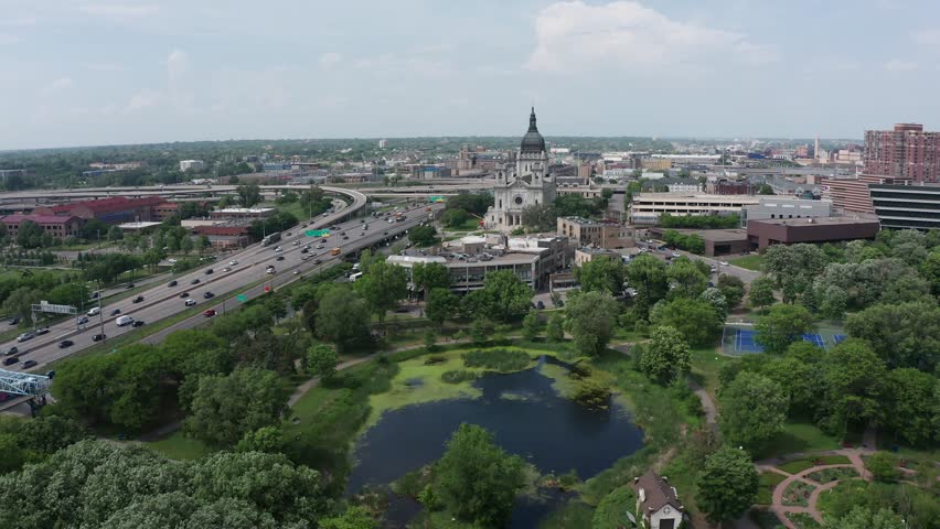 Aerial wide push-in shot of the Basilica of Saint Mary in Minneapolis, Minnesota. 4K Royalty-Free Stock Footage #1105240873