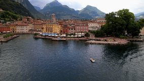 Scenic Garda lake and popular resort Riva del Garda. aerial drone overflight 4k video. Trentino, Lago di Garda, Italy