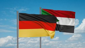 Sudan and Germany flag waving together in the wind on blue sky, cycle looped video, two country cooperation concept