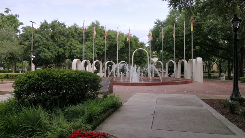 Spanish Park Plaza water fountain in Mobile, Alabama with gimbal video walking forward close up.
