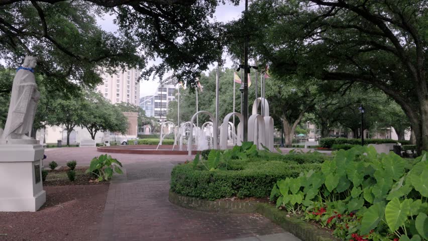 Spanish Plaza Park in Mobile, Alabama with gimbal video walking forward.