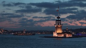 Maiden's Tower aka Kiz Kulesi view with cityscape of Istanbul and a ferry on the background 4K video. Landmarks of Istanbul.