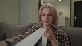 Young Adult Woman Shocked with High Expenses Holding Receipt. - Powered by Shutterstock - Get 15% off with code: PIKWIZARD15