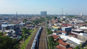 aerial video of an Indonesian train that is moving