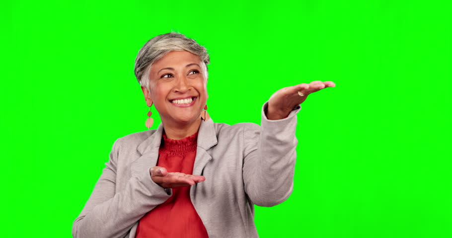 Presentation, marketing and a business woman on a green screen background in studio for advertising. Branding, product or logo and a senior female manager on chromakey mockup to show information