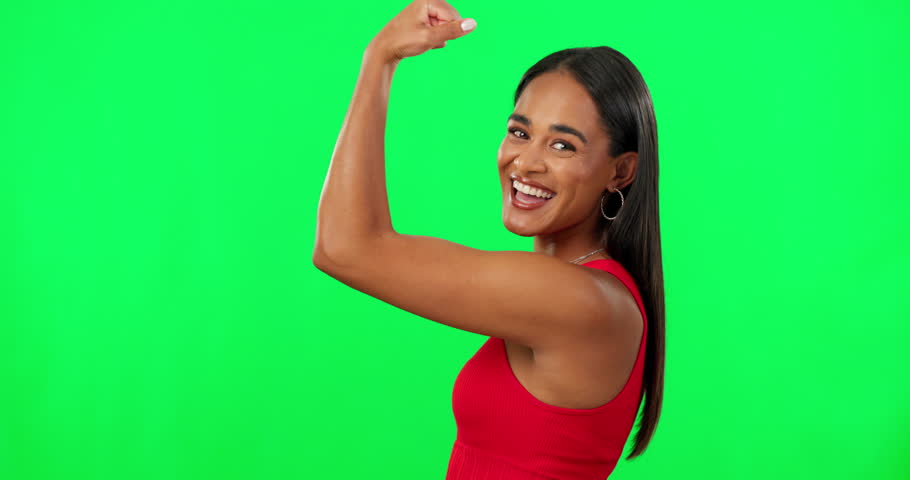 Woman, power and champion, flexing on green screen with muscle and strong person isolated on studio background. Portrait, smile and challenge, winner emoji and female model, biceps and mockup space