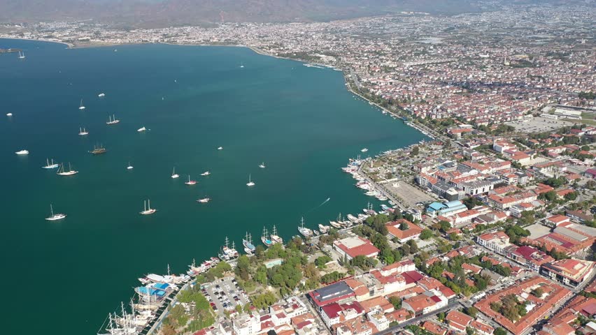 Aerial panoramic view of Fethiye city bay with boats. Fethiye city marina Royalty-Free Stock Footage #1105266683