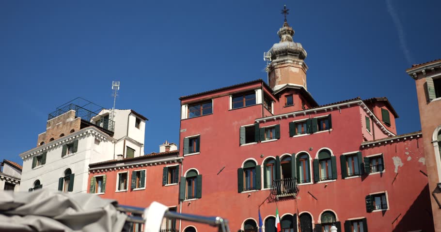 View of the architecture of the Grand Canal from a water taxi in Venice, Italy.