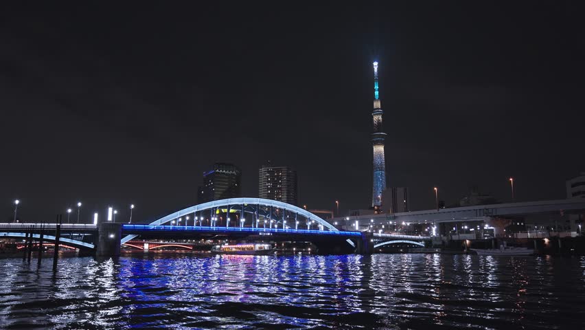 Tokyo night light, Asakusa, Komagata bridge, pleasure boat going through Sumida River