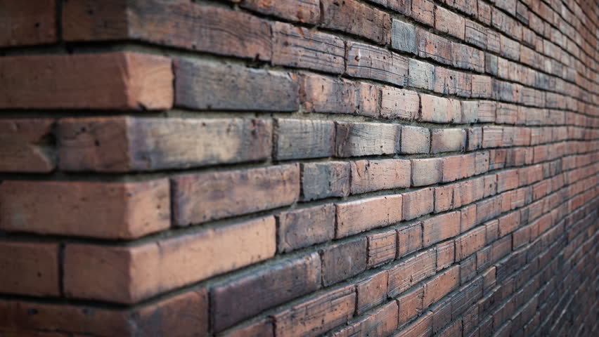 old red brick wall corner background.