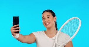 Woman, video call and talking in studio for sport, tennis or happy for conversation by blue background. Professional athlete girl, communication or webinar for chat with training, fitness or wellness