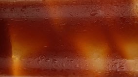 Black coffee with ice, extreme macro. Coffee drinks concept. Vertical video - Powered by Shutterstock - Get 15% off with code: PIKWIZARD15