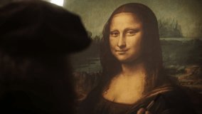 Close Up on The Painting of the Mona Lisa Being Created by Leonardo da Vinci in his Workshop. Renaissance Era Historical Figure and Painter Gently Adding Details to his Masterpiece on the Canvas - Powered by Shutterstock - Get 15% off with code: PIKWIZARD15