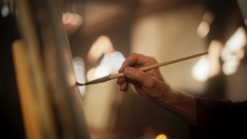 Close Up on Male Painter Hand Painting the Mona Lisa with Gentle Brush Movement. Details of the Famous Painting Being Drawn by its Creator. Pure Talent and Mastery of High Art, Everlasting Beauty