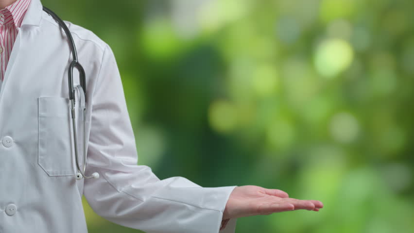 Medical worker recommend ecologic drug or medicament. Doctor pharmacist is showing natural eco health care product. Natural cosmetics and bio herb farmacy concept. Copy space for text or logo