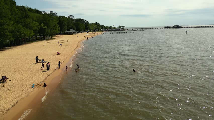 Aerial view of beach goers on Mobile Bay, Alabama