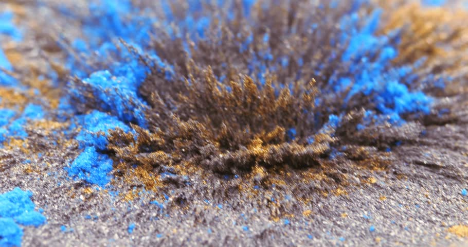 Yellow and blue metallic dust, chips, iron powder under the influence of a magnetic field. Abstract background. The surface is a color movable background. The natural phenomenon of magnetism of Royalty-Free Stock Footage #1105332295