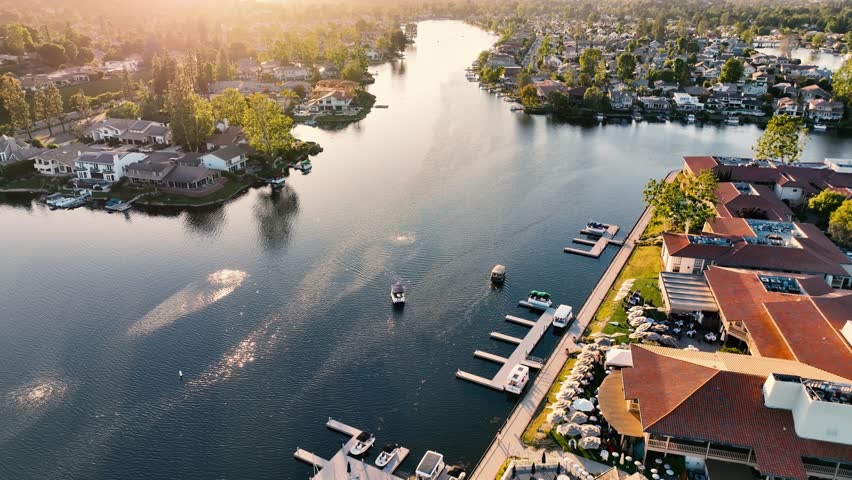 Ariel view of the lake in Westlake Village, CA at sunset Royalty-Free Stock Footage #1105341251