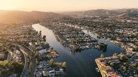 Drone flying over Westlake in Westlake Village in CA at sunset