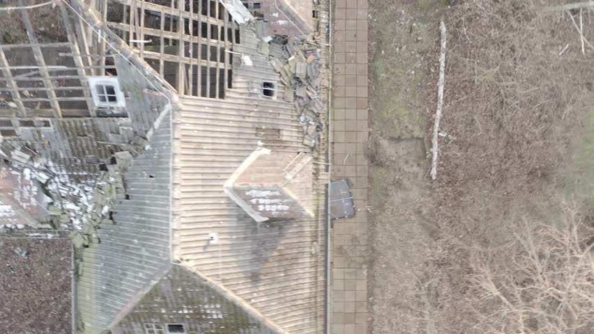 Aerialfootage of abandoned House in a suburb of Berlin with collapsing roof.
