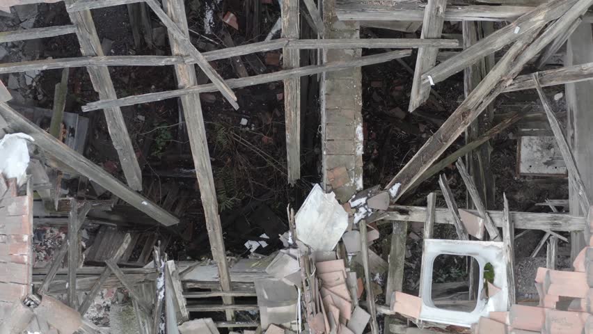 Aerialfootage of abandoned House in a suburb of Berlin with collapsing roof.
