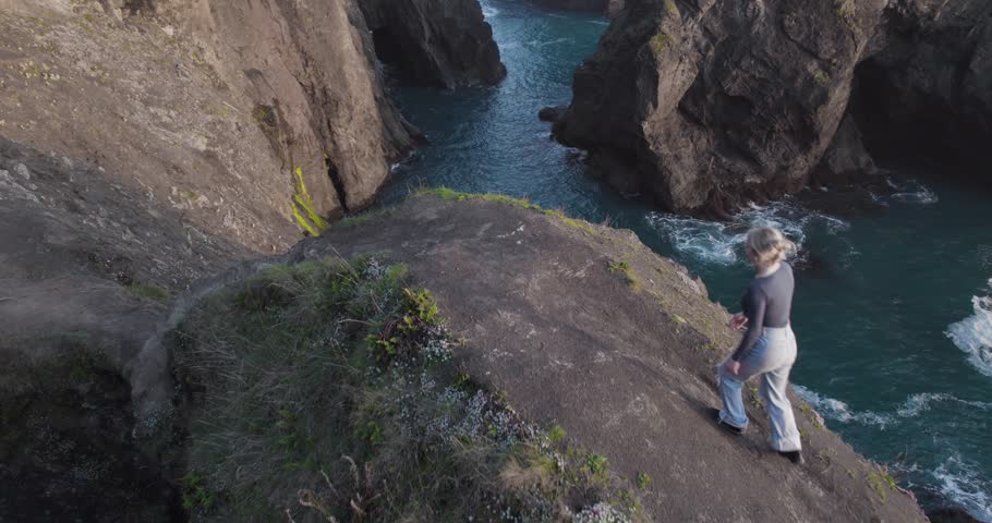 Woman on Oregon Coast - Cinematic Aerial Tilt-up Reveal, Wanderlust Concept