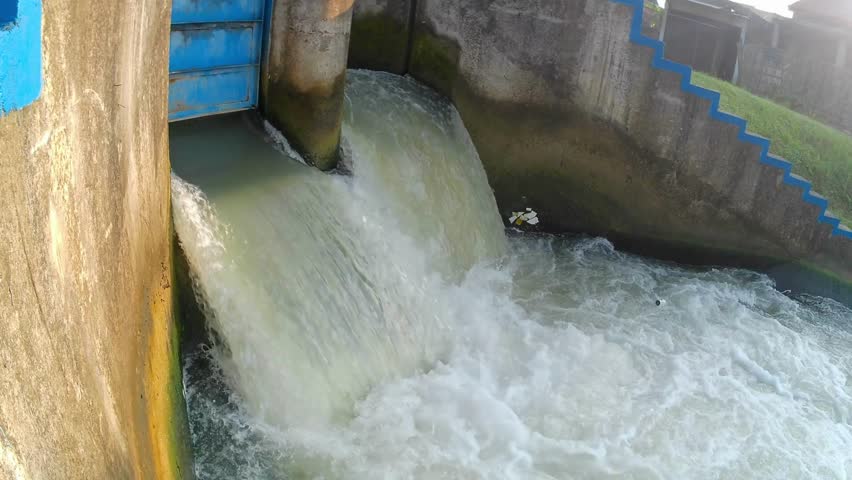 irrigation channels Tajum with falling water that is quite heavy and make the water froth. Royalty-Free Stock Footage #1105355521