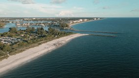 USA, Venice, Florida (North Jetty Beach). Aerial video. Summer. People on the beach.
