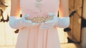 Close-up art portrait young woman princess wears royal crown on head long flowing red hair. pink color dress beauty face. Young woman fantasy queen fairy elf lady. fashion model evening prom makeup 4k - Powered by Shutterstock - Get 15% off with code: PIKWIZARD15