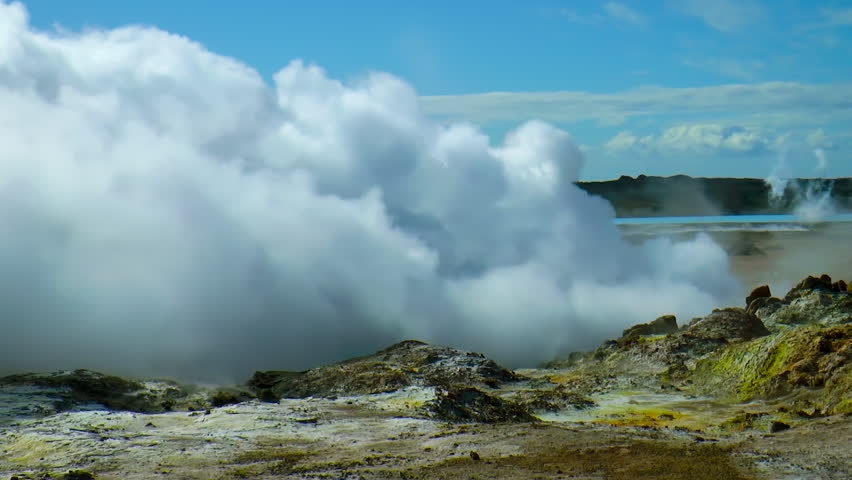 Dense smoke from steaming hot springs and fumaroles in Gunnuhver Hot Springs Geothermal Area and Geothermal Power Plant located on Reykjanes Penninsula in Iceland