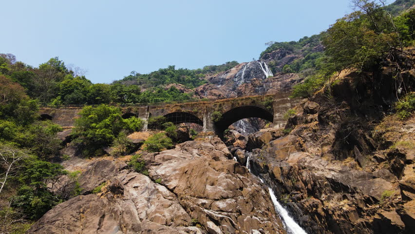 Flying Towards Dudhsagar Falls On The Mandovi River In The Indian State Of Goa. Aerial Drone Shot