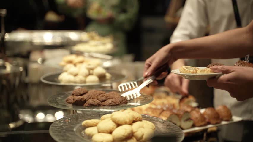 Open buffet with shiny look. Buffet restaurant, the hotel restaurant. Turkish or Arabic food Royalty-Free Stock Footage #1105370643