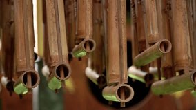 Indonesian traditional musical instrument called Angklung, made from bamboo. Close up of Sundanese musical instrument.
