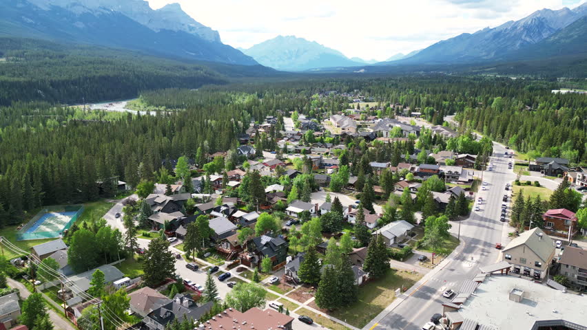 Town of Canmore, Areal view. residential, mountains,  Banff National Park, Alberta, Canada. 4K Royalty-Free Stock Footage #1105372829