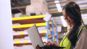 Asian Engineer woman wear vest safety typing laptop while check details and product inventory in warehouse at factory - Powered by Shutterstock - Get 15% off with code: PIKWIZARD15