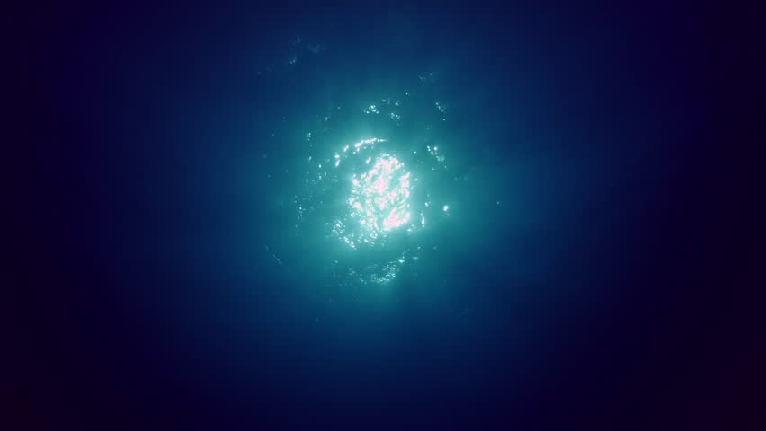 View of sun light from blue abyss, slow motion. Light filters down through blue water. Underwater sun rays in depth ocean. Underwater light, sun light shine under deep water with ripples on surface Royalty-Free Stock Footage #1105383765