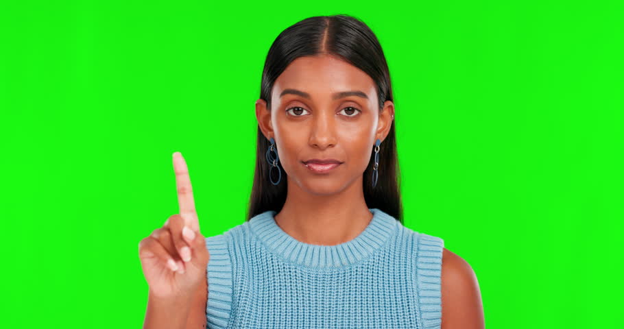 No, finger and face of indian woman on green screen, studio and shake head for stop, wrong sign or warning. Portrait, hand and female model with feedback of bad review, negative emoji and rejection