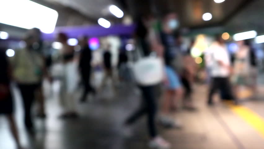 Blurred, Crowd of people walking in BTS skytrain station Bangkok Thailand, city life background Royalty-Free Stock Footage #1105388499