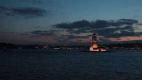 Istanbul at night. Maiden's Tower aka Kiz Kulesi with partly cloudy sky 4k video. Visit istanbul concept footage.
