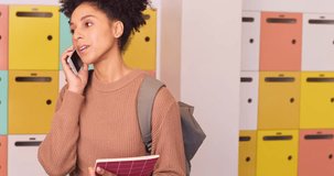 Young female student answers phone call receive bad news at college, big sigh