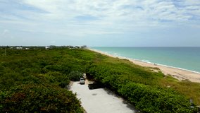 Aerial video Hobe Sound Jupiter Island Florida rising beach and nature scene