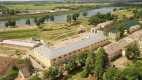 Aerial 4K video from drone to Daugavpils fortress and Daugavpils Mark Rothko Art Centre on a beautiful sunny summer day. Daugavpils, Latvia, Latgale, Europe