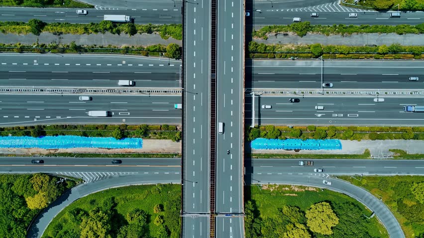 Modern highway and Data technology concept. Smart transportation. ITS (Intelligent Transport Systems). Mobility as a service.Composite visual with a drone point of view. Mixed media. Royalty-Free Stock Footage #1105409451