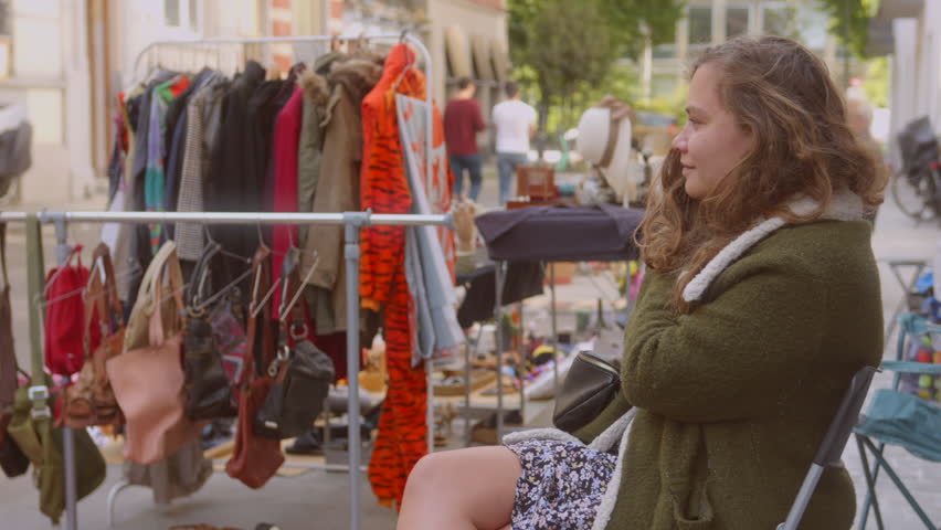 Portrait Of A Young Woman On A Second Hand (Brocante) Trade Market