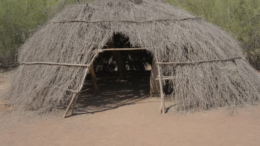 This video shows a front view of an ancient Native American manmade hut.