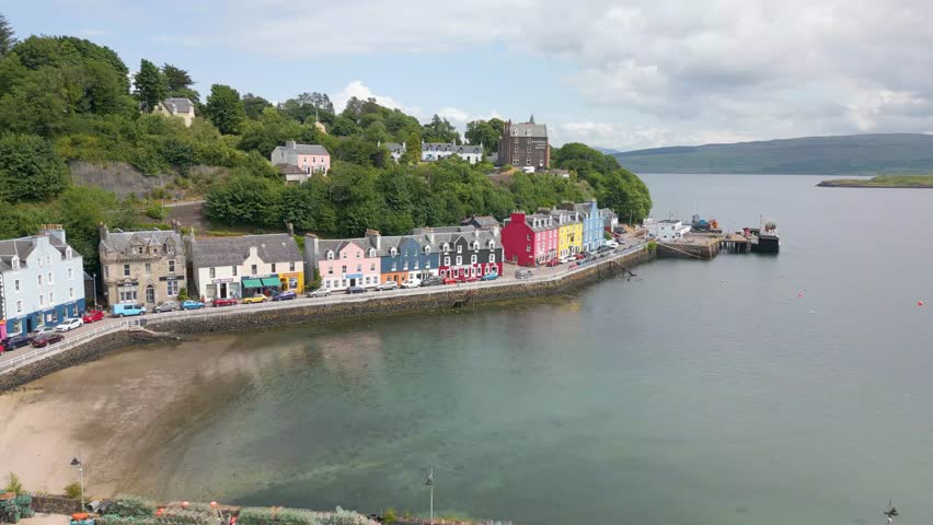This is an aerial drone shot of the town Tobermory. An little fishing town on the north-east side of the Isle of Mull. a small island on the the west side of Scotland. Royalty-Free Stock Footage #1105420649