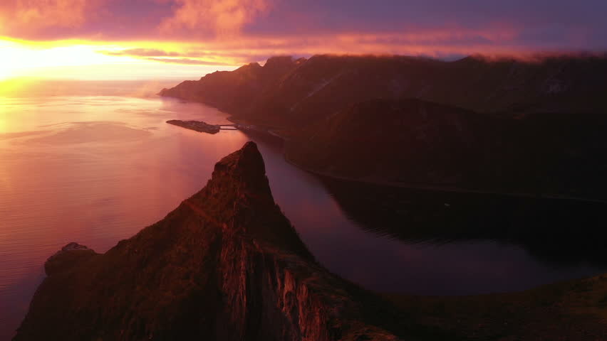 Sunset over Fjord and Mountain on Senja Island in Norway, aerial view from drone | Shutterstock HD Video #1105426821